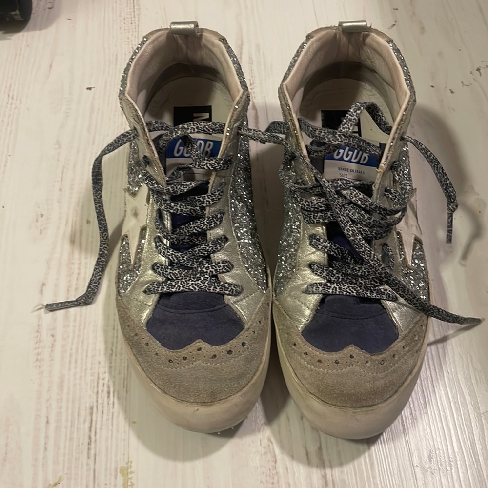 worn a lot golden goose.